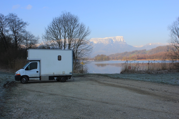The van parked up at the lake